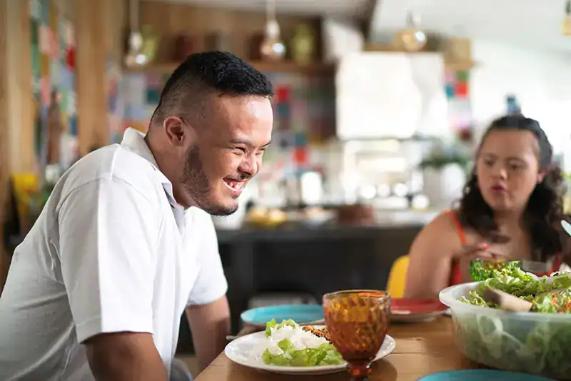 Empowering Weight Loss: A Comprehensive Guide for Individuals with Disabilities 2 Image of a disabled man and balance around nutrition to aid weight loss England