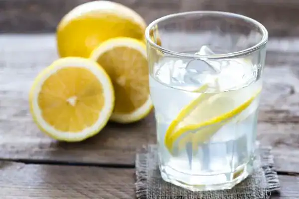 Hydration: The Secret Ingredient for a Toned Stomach and Enhanced Fitness 2 Image of lemon water to aid hydration England